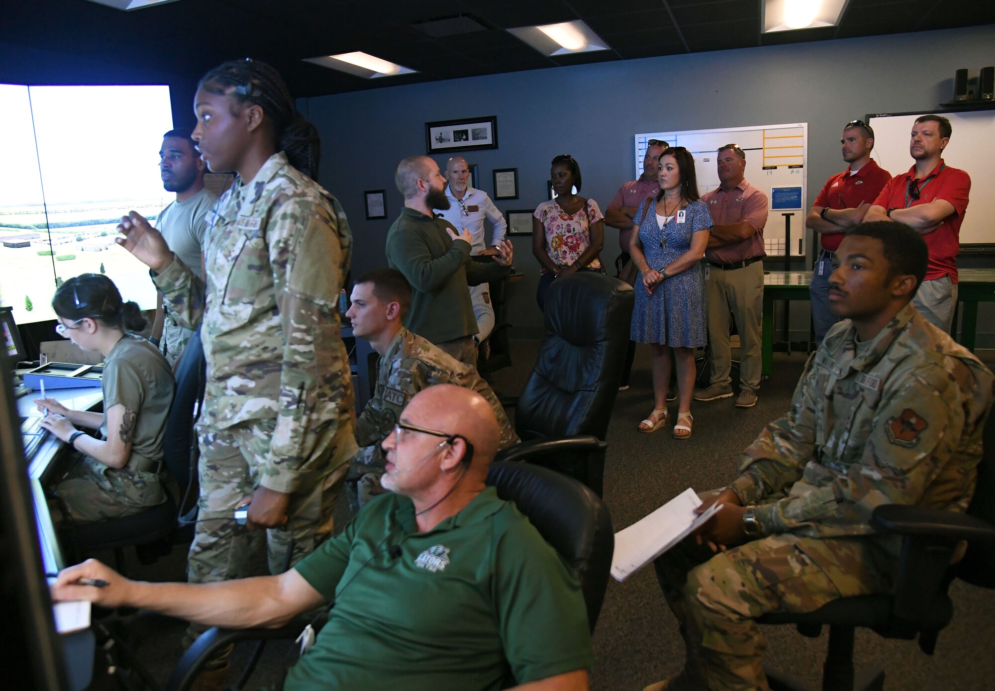 Members of the Biloxi and Jackson County School Districts administration tour the 334th Training Squadron air traffic control course inside Cody Hall at Keesler Air Force Base, Mississippi, July 7, 2022. The visit also included a tour of the student dorms and the weather training course. (U.S. Air Force photo by Kemberly Groue)