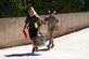 A drill instructor welcomes a young man to basic cadet-candidate training at the U.S. Air Force Academy Preparatory School, June 8, 2022. (U.S. Air Force photo/Trevor Cokley)