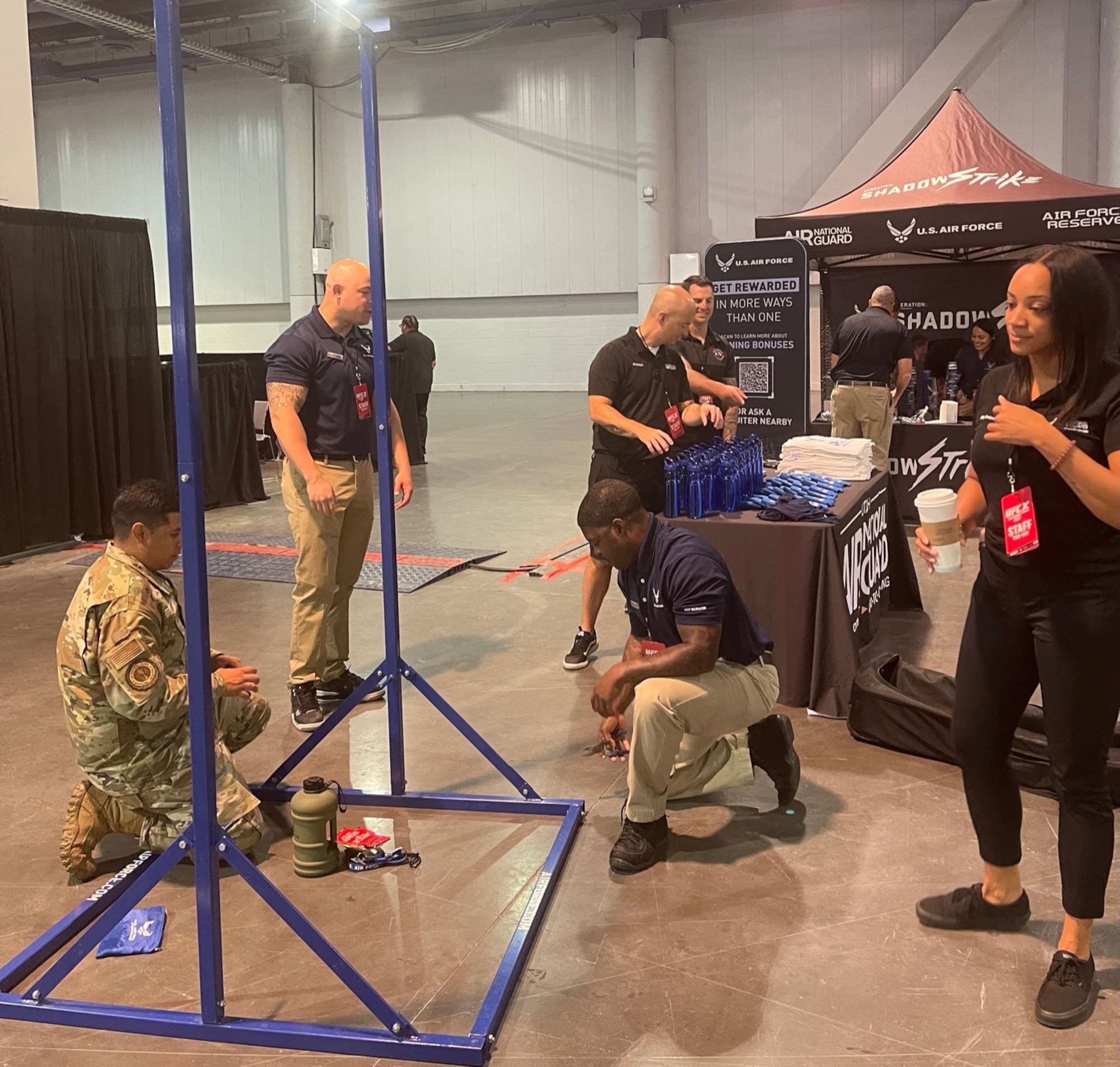 Recruiters from the Air National Guard, Air Force Reserve and Air Force active duty set up a Total Force recruiting booth at the Ultimate Fighting Championship International Fight Week event in Las Vegas, June 27-July 3, 2022.