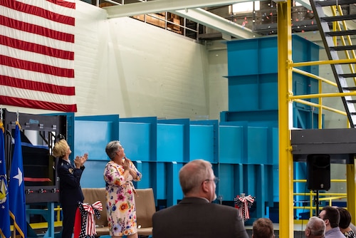Air Force Research Laboratory Commander Maj. Gen. Heather Pringle and Davilyn Parker, wife of AFRL Aerospace Engineer Dr. Greg Parker, view confetti during a ribbon-cutting and dedication ceremony for the lab’s newest wind tunnel, the Parker Subsonic Research Facility, or SuRF, at Wright-Patterson Air Force Base, Ohio, July 7, 2022. The facility is named after Dr. Greg Parker, a beloved member of AFRL's Aerospace Systems Directorate, who died after a long battle with cancer. SuRF is a low-speed wind tunnel used to evaluate prototype models including 3D-printed components that allows engineers to validate new aircraft designs. (U.S. Air Force photo / Rick Eldridge)