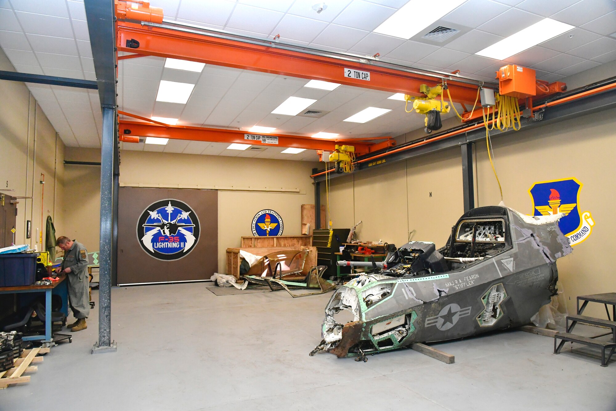 An F-35 canopy deemed unserviceable and unfit for flight sits in a crate May 4, 2022, at Hill Air Force Base, Utah. The canopy frame will be rebuilt and installed on a salvaged F-35B cockpit section and turned into a sectional training aids by the 372nd Training Squadron, Det. 3, for use during instruction of F-35 maintainers. (U.S. Air Force photo by Todd Cromar)