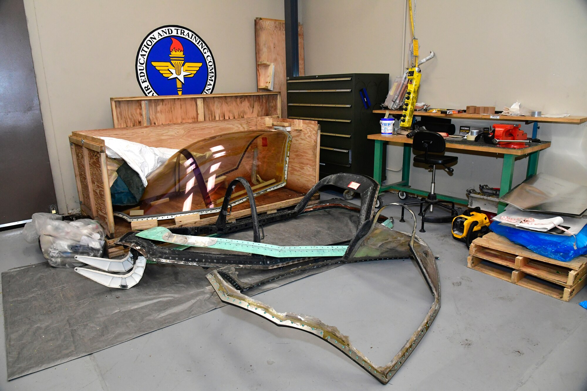 An F-35 canopy deemed unserviceable and unfit for flight sits in a crate May 4, 2022, at Hill Air Force Base, Utah. The canopy frame will be rebuilt and installed on a salvaged F-35B cockpit section and turned into a sectional training aids by the 372nd Training Squadron, Det. 3, for use during instruction of F-35 maintainers. (U.S. Air Force photo by Todd Cromar)