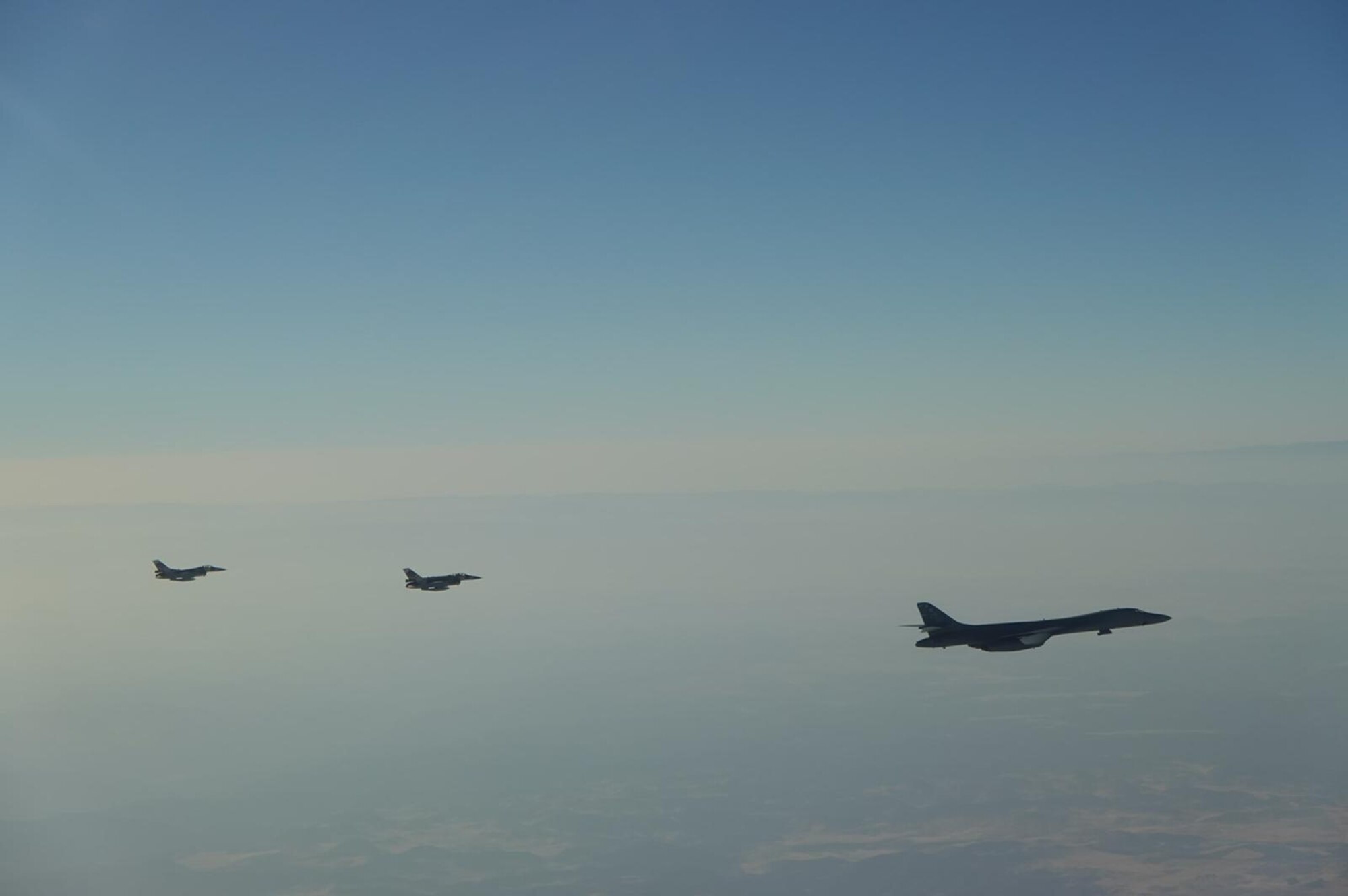 B-1B Lancer bombers from Dyess Air Force Base, Texas, fly with Royal Moroccan Air Force F-16 and F-5 aircraft off the coast of Morocco, June 30, 2022, in support of African Lion 2022. African Lion 2022 (AL22) is U.S. Africa Command's largest, premier, joint, annual exercise hosted by Morocco, Ghana, Senegal and Tunisia, June 6 - 30. More than 7,500 participants from 28 nations and NATO train together with a focus on enhancing readiness for U.S. and partner nation forces. AL22 is a joint all-domain, multi component, and multinational exercise, employing a full array of mission capabilities with the goal to strengthen interoperability among participants and set the theater for strategic access.

(U.S. Air Force Courtesy Photo)