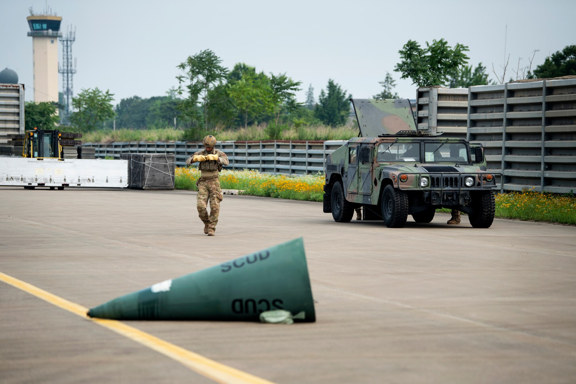 U.S. Air Force Staff Sgt. Michael Augustus, a 35th Civil Engineer Squadron, Explosive Ordnance Disposal technician from Misawa Air Base, Japan, prepares to respond to a mock chemical weapon disposal scenario at Suwon Air Base, Republic of Korea, July 6, 2022.