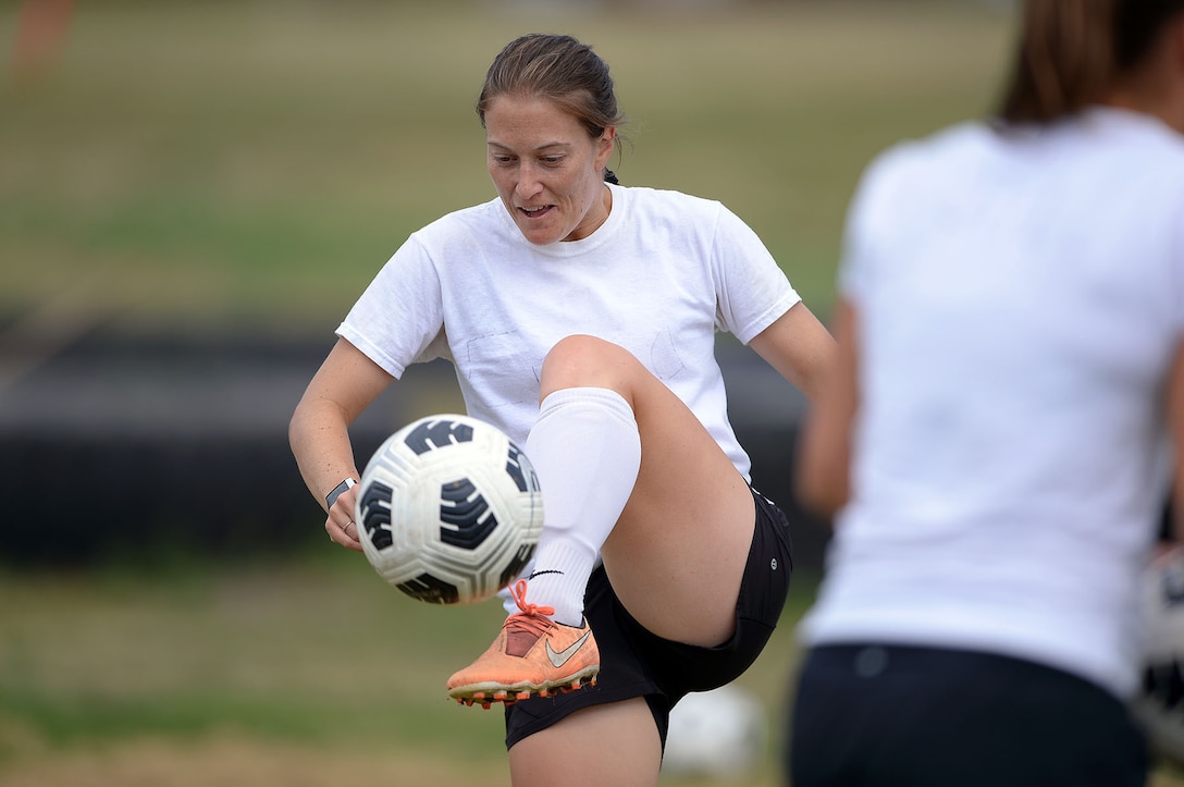 Army Capt. Erica Jarmer of the U.S. Armed Forces Women’s Soccer Team kicks a ball during practice for the 13th CISM (International Military Sports Council) World Military Women’s Football Championship at Fairchild Air Force Base in Spokane, Washington July 9, 2022. (DoD photo by EJ Hersom)