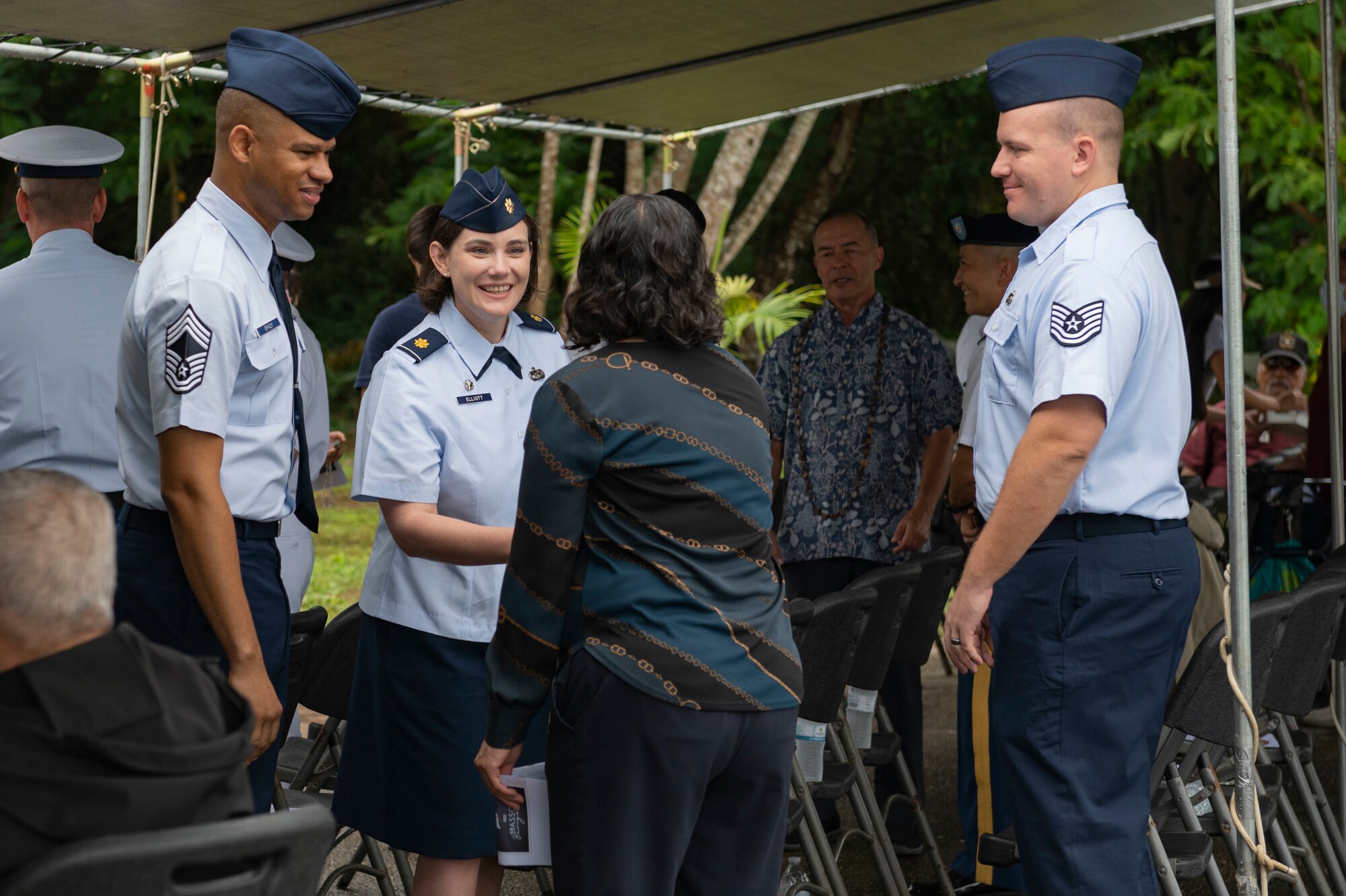 An Airman shakes a locals hand.