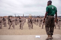 U.S. Marine Corps Sgt. Thomas McKnight, a martial arts instructor with Recruit Training Regiment, teaches recruits bayonet assault techniques on Marine Corps Recruit Depot San Diego, July 6, 2022.