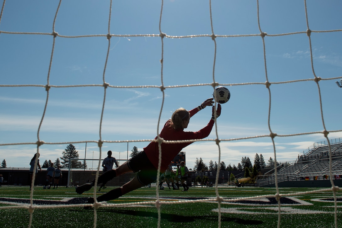 U.S.Army Capt. Kelly Fitzgerald of the U.S. Armed Forces Women’s Soccer Team makes a save during practice for the 13th CISM (International Military Sports Council) World Military Women’s Football Championship in Mead, Wash. July 10, 2022. (DoD photo by EJ Hersom)