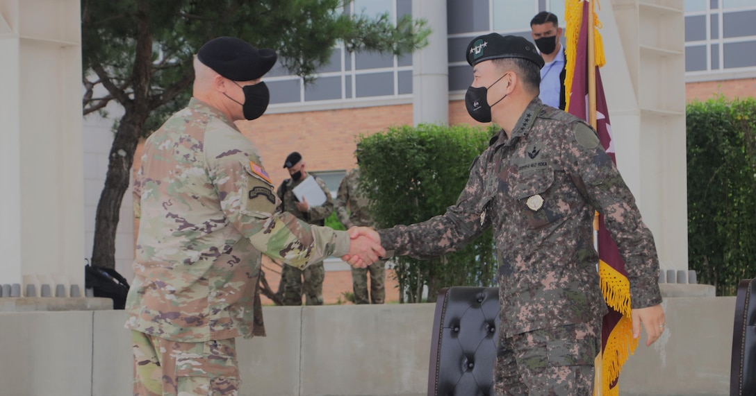 Gen. Paul J. LaCamera, Commander of United Nations Command, Combined Forces Command, and U.S. Forces Korea, hosts an honor guard ceremony to welcome Gen. Kim, Seung-kyum, Republic of Korea’s incoming chairman of the Joint Chiefs of Staff at Camp Humphreys, Republic of Korea, July 12, 2022.