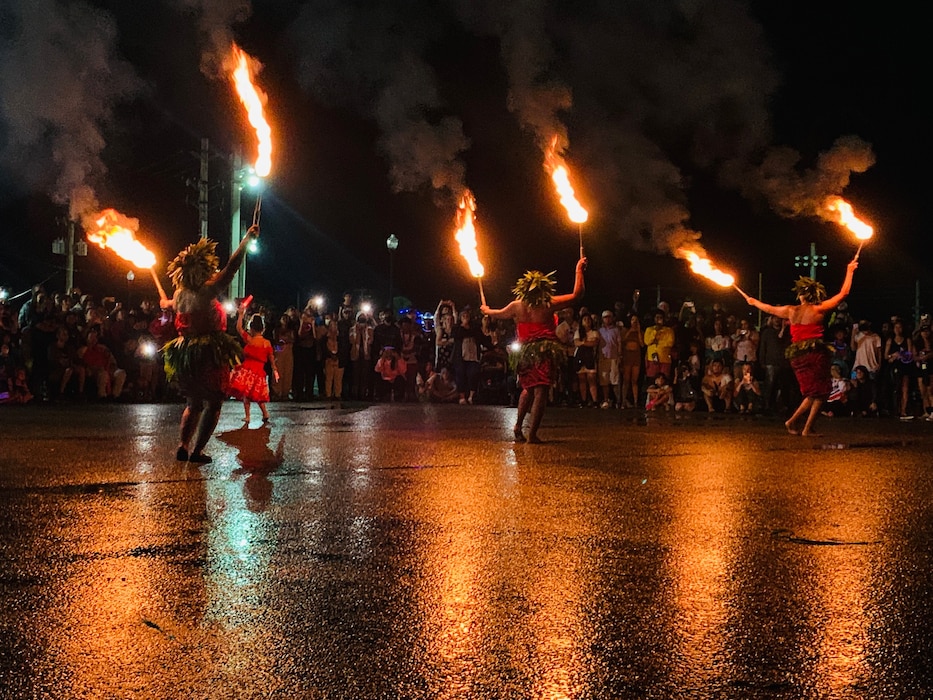 POLARIS POINT, Guam (July 4, 2022) - Fire knife dancers perform at U.S. Naval Base Guam's (NBG) Freedom Rocks Festival 2022. Hundreds of Guam residents gathered to celebrate Independence Day during the annual Freedom Rocks Festival at NBG - Polaris Point July 4.