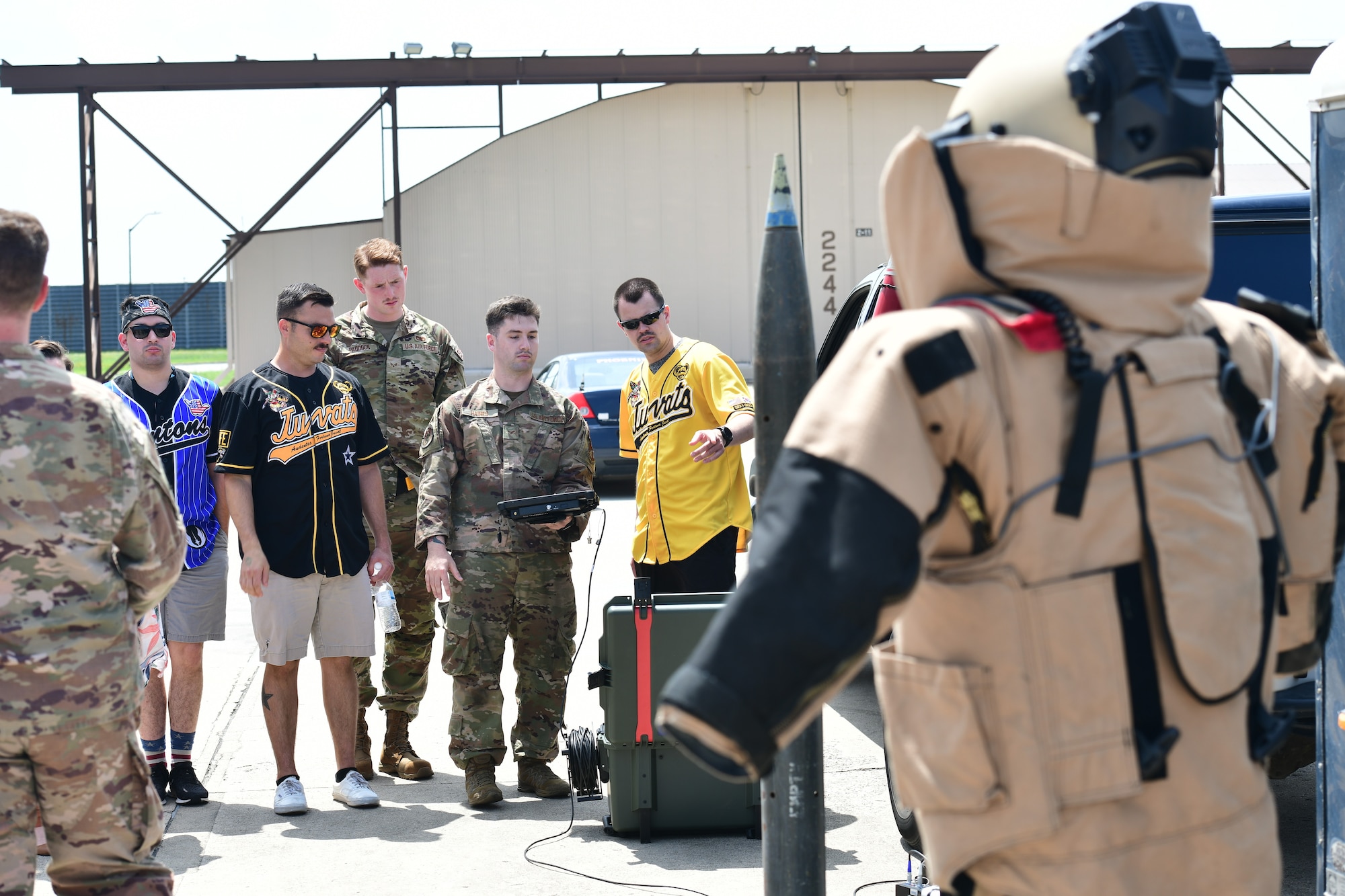 Airmen standing for demonstration.