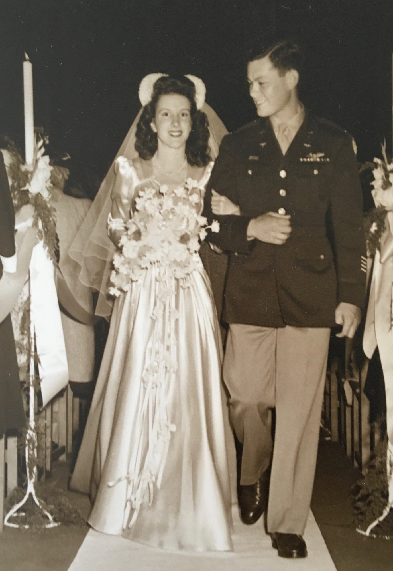 Barbara and 1st Lt. Robert “Bob” Wolff walk down the aisle after getting married July 8, 1945, in California. Wolff was a B-17 Flying Fortress pilot with the 100th Bomb Group, Thorpe Abbotts, England, during World War II, and kept as a prisoner-of-war at Stalag Luft III, Germany, for approximately 18 months. He and Barb married a few months after he returned home to California, and are still together 77 years later. (Photo courtesy of Nancy Phelps and Bob Wolff)