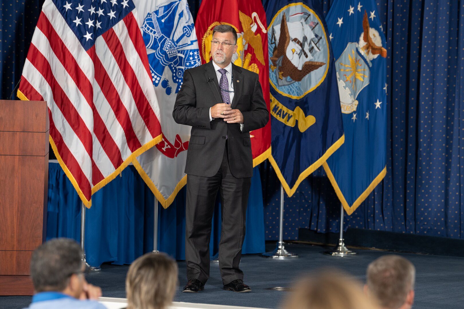 DLA Energy Deputy Commander David Kless on stage