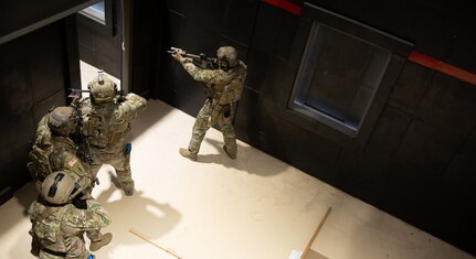 Soldiers from the 19th Special Forces Group (Airborne) perform demonstrate advanced urban combat during the opening of the Special Operations Forces Live-Fire Shoot House at Camp Williams, Utah, July 11, 2022. The facility will primarily support U.S. Army Special Operations Forces in addition to Utah Army National Guard Soldiers and law enforcement agencies.