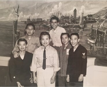 Several Stewards (SN) posing for a picture at the CG Yard Officer's Mess (now Berry Hall) in the early 1960s.  SN3 PISARES is second from the left.  To his right is Ben Bayany.  SNC Mendoza is in the middle.  In the back to his left is SN De Rosa.  Second from the right is SN De Castro.  SN2 Pascual is on the far right.