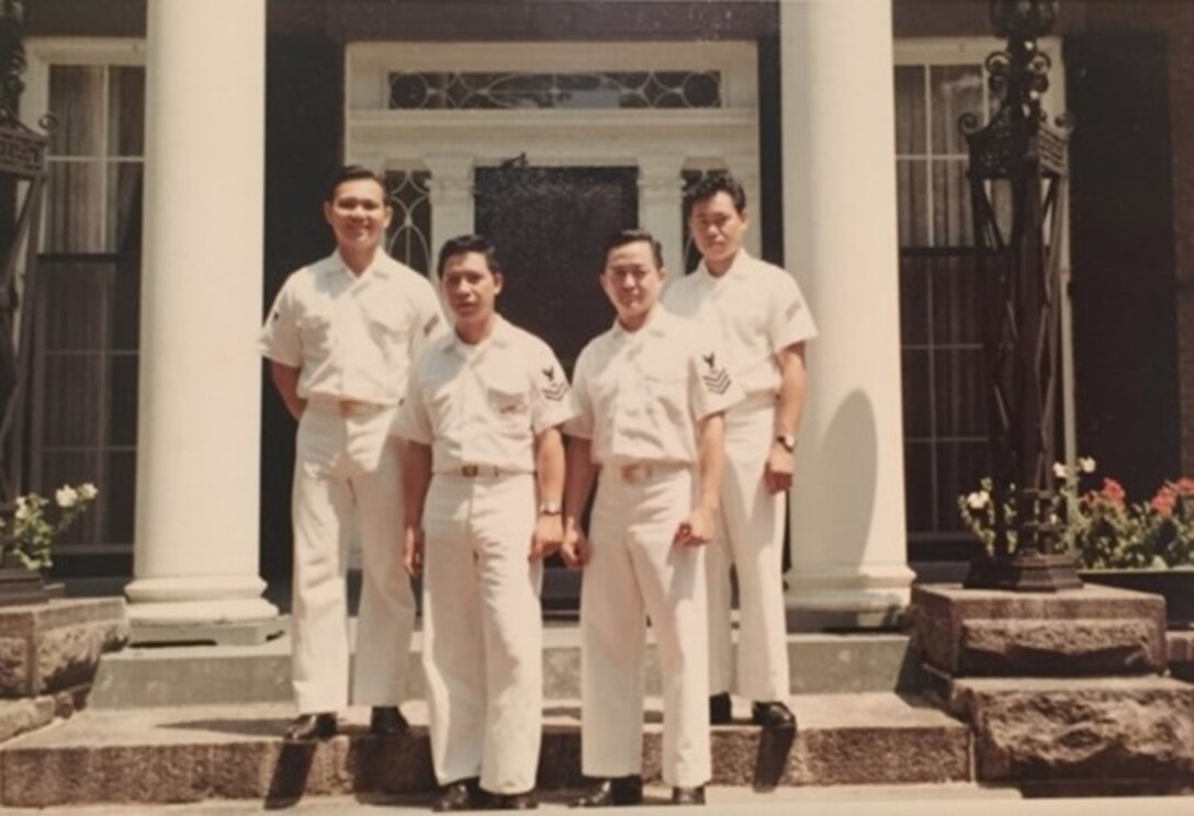 Several Stewards (SN) and Stewardsman (TN) standing in front of the Vice Admiral's house on Governor's Island, NY, in Spring, 1967.  From left to right: TN Tony Vintingan; SN2 Primo Pisares; SN1 Tommy Tolentino; TN Simplicio.