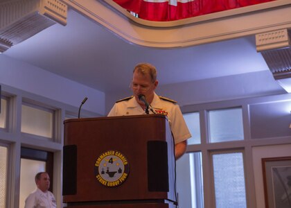 Rear Adm. Jeffery Czerewko, left, relives Rear Adm. Richard Brophy as the commander of Carrier Strike Group (CSG) 4 during a change of command ceremony.