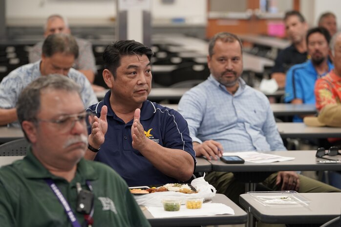 Dan Yamane, Director of Quality Assurance for Pearl Harbor Naval Shipyard and Intermediate Maintenance Facility (PHNSY & IMF), discusses Naval Sustainment System – Shipyard initiatives with Vice Adm. Bill Galinis, Commander of Naval Sea Systems Command (NAVSEA), May 12, 2022.

Both Galinis and Ms. Giao Phan, Executive Director for NAVSEA, participated in several small-group discussions with project leadership teams and engineers discussing NSS-SY initiatives. During these discussions, Galinis underscored the importance of the work done by the PHNSY & IMF team and the corporate-wide Navy effort to improve the production performance inside the four naval public shipyards. (Official U.S. Navy photo by Marc Ayalin)