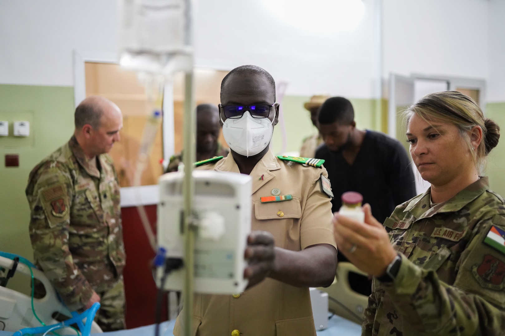 Indiana Air National Guard 2nd Lt. Amanda J. Barton, a critical care air transport team nurse with the 122nd Fighter Wing Medical Group, conducts hands-on training with medical members of the Niger armed forces, June 17-24, 2022, in Niamey, Niger. Indiana and Niger have been partners under the Department of Defense National Guard Bureau State Partnership Program since 2017.