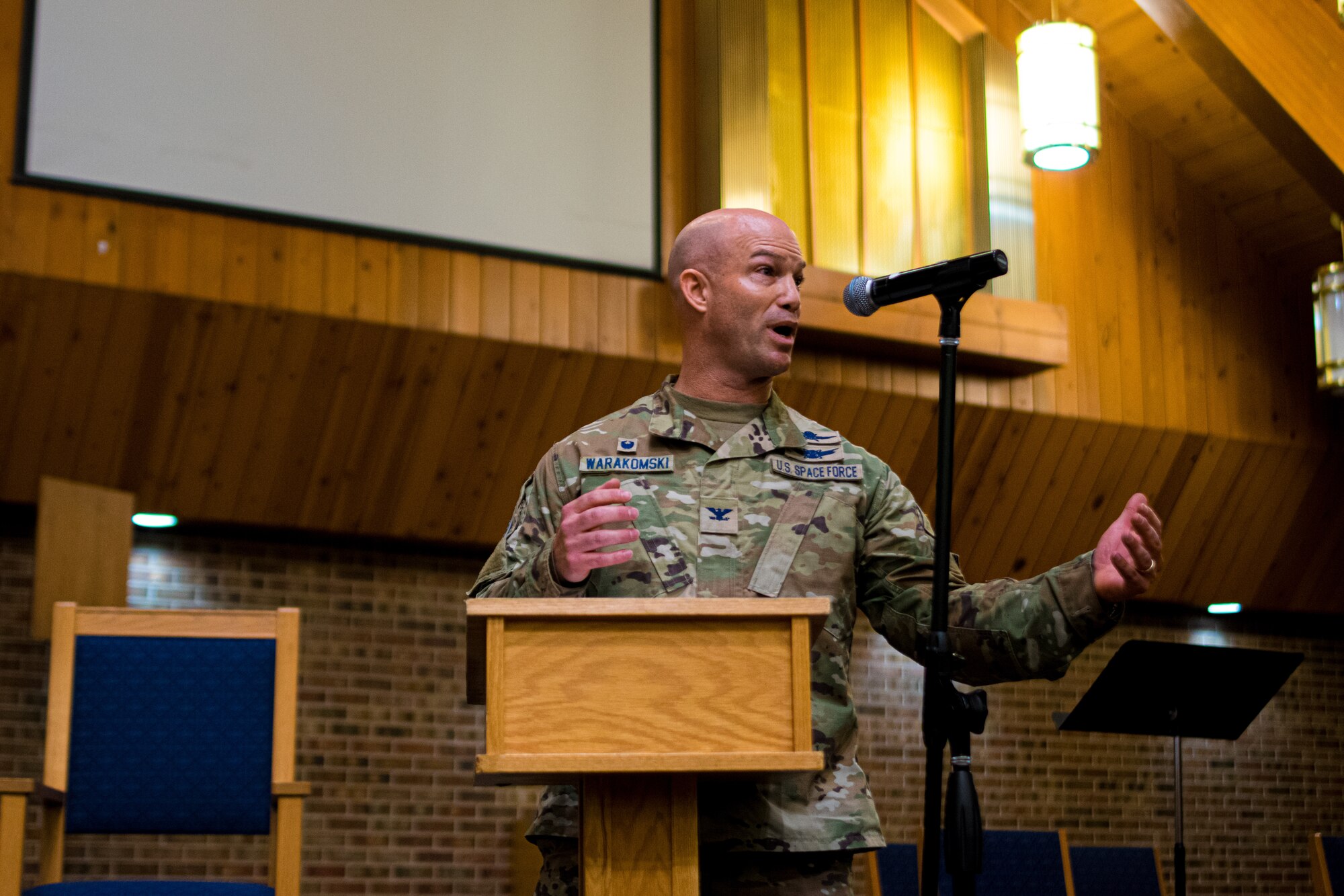 U.S. Space Force Col. Shay Warakomski, Space Base Delta 1 commander, congratulates the volunteers who make up the second-ever class of the SBD 1 Chaplain Corps’ White Rope Leadership Program, Flight 22 Bravo, on Peterson Space Force Base, Colorado, July 8, 2022. “You all are the ones that have stepped out above and beyond what your peers are willing to do,” said Warakomski during his remarks. “I applaud you because you are the future leaders of our enlisted force. Thank you.” (U.S. Space Force photo by Fiona Truant)