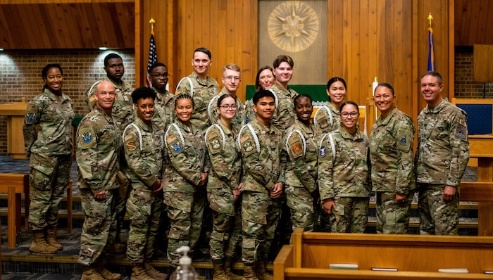 Leadership from Space Base Delta 1 and the chapel on Peterson Space Force Base join the second-ever class of the SBD 1 Chaplain Corps’ White Rope Leadership Program, Flight 22 Bravo, at their induction ceremony at Peterson SFB, Colorado, July 8, 2022. White Ropes provide the Chaplain Corps additional liaisons and points of contact within the Peterson SFB, Schriever Space Force Base and Cheyenne Mountain Space Force Station communities, aiding the Corps’ mission to ensure spiritual and mental fitness across the Front Range. (U.S. Space Force photo by Fiona Truant)