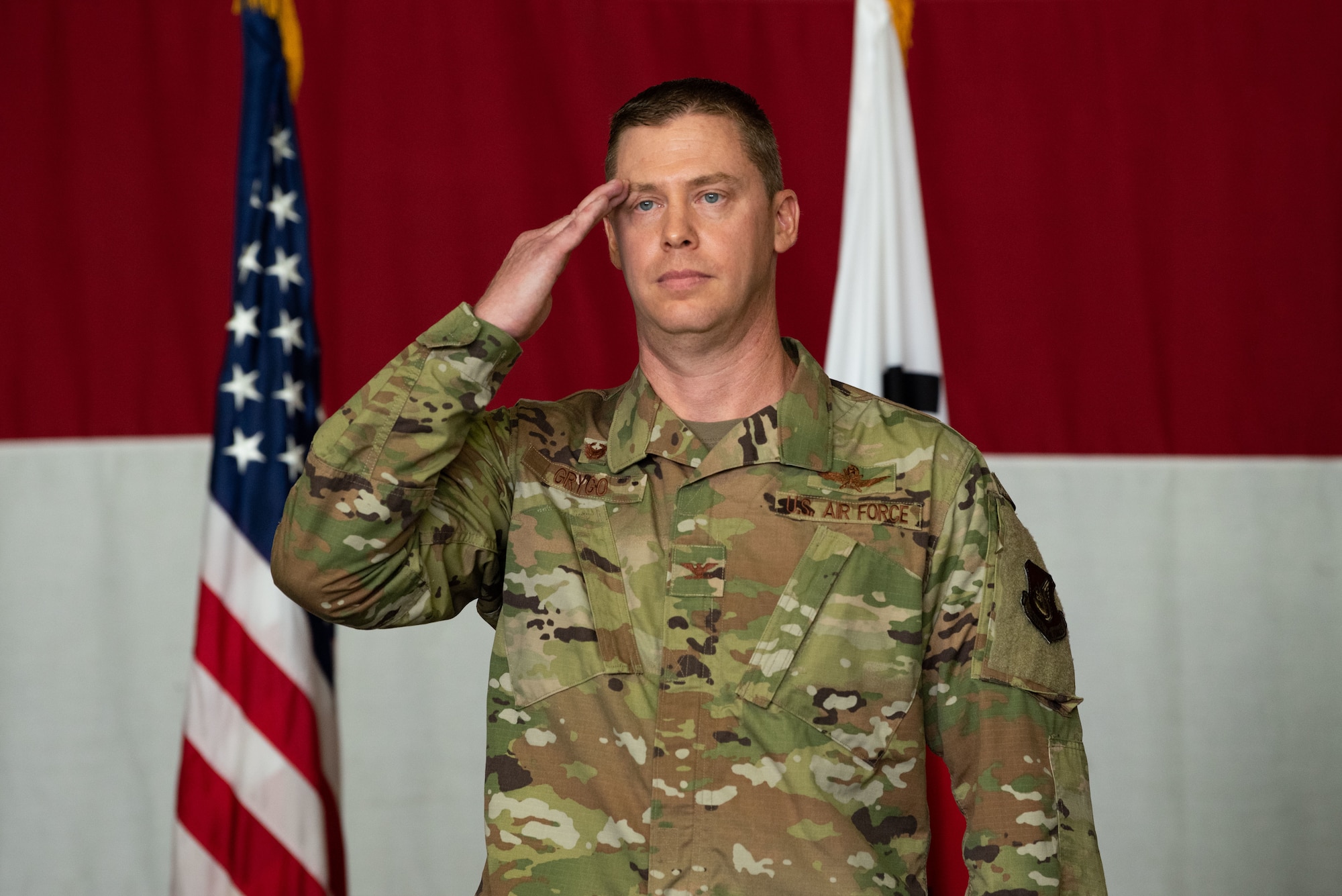 Col. Kyle Grygo, 51st Mission Support Group incoming commander, renders his first salute as commander during the 51st MSG change of command ceremony at Osan Air Base, Republic of Korea, July 13, 2022.
