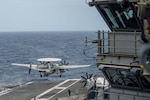 SOUTH CHINA SEA (July 13, 2022) An E-2D Hawkeye attached to the Tigertails of Airborne Early Warning Squadron (VAW) 125 launches from the flight deck of the U.S. Navy’s only forward-deployed aircraft carrier USS Ronald Reagan (CVN 76). E-2D Hawkeyes perform tactical airborne early warning missions to provide valuable information to Carrier Strike Group 5 as it plans and executes operations. Ronald Reagan, the flagship of Carrier Strike Group 5, provides a combat-ready force that protects and defends the United States, and supports alliances, partnerships and collective maritime interests in the Indo-Pacific region. (U.S. Navy photo by Mass Communication Specialist 3rd Class Gray Gibson)