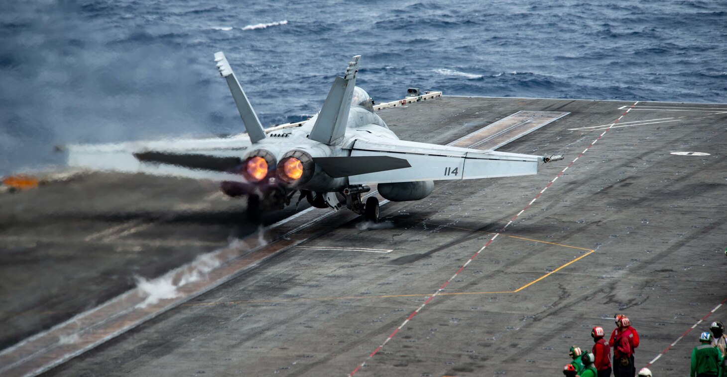 SOUTH CHINA SEA (July 13, 2022) An F/A-18F Super Hornet attached to the Diamondbacks of Strike Fighter Squadron (VFA) 102 launches from the flight deck of the U.S. Navy’s only forward-deployed aircraft carrier USS Ronald Reagan (CVN 76). The Diamondbacks conduct carrier-based air strike and strike force escort missions, as well as ship, battle group, and intelligence collection operations. Ronald Reagan, the flagship of Carrier Strike Group 5, provides a combat-ready force that protects and defends the United States, and supports alliances, partnerships and collective maritime interests in the Indo-Pacific region. (U.S. Navy photo by Mass Communication Specialist 3rd Class Gray Gibson)