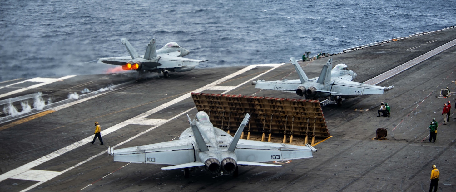 SOUTH CHINA SEA (July 13, 2022) An F/A-18F Super Hornet attached to the Diamondbacks of Strike Fighter Squadron (VFA) 102 launches from the flight deck of the U.S. Navy’s only forward-deployed aircraft carrier USS Ronald Reagan (CVN 76). The Diamondbacks conduct carrier-based air strike and strike force escort missions, as well as ship, battle group, and intelligence collection operations. Ronald Reagan, the flagship of Carrier Strike Group 5, provides a combat-ready force that protects and defends the United States, and supports alliances, partnerships and collective maritime interests in the Indo-Pacific region. (U.S. Navy photo by Mass Communication Specialist 3rd Class Gray Gibson)