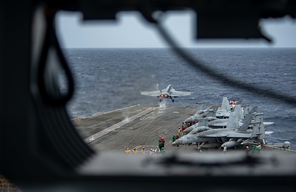 SOUTH CHINA SEA (July 13, 2022) An F/A-18E Super Hornet attached to the Dambusters of Strike Fighter Squadron (VFA) 195 launches from the flight deck of the U.S. Navy’s only forward-deployed aircraft carrier USS Ronald Reagan (CVN 76). The Diamondbacks conduct carrier-based air strike and strike force escort missions, as well as ship, battle group, and intelligence collection operations. Ronald Reagan, the flagship of Carrier Strike Group 5, provides a combat-ready force that protects and defends the United States, and supports alliances, partnerships and collective maritime interests in the Indo-Pacific region. (U.S. Navy photo by Mass Communication Specialist 3rd Class Gray Gibson)