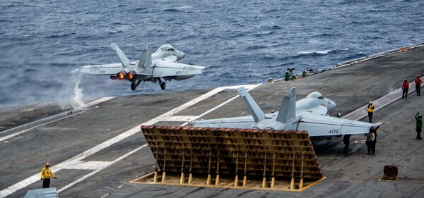 SOUTH CHINA SEA (July 13, 2022) An F/A-18F Super Hornet attached to the Diamondbacks of Strike Fighter Squadron (VFA) 102 launches from the flight deck of the U.S. Navy’s only forward-deployed aircraft carrier USS Ronald Reagan (CVN 76). The Diamondbacks conduct carrier-based air strike and strike force escort missions, as well as ship, battle group, and intelligence collection operations. Ronald Reagan, the flagship of Carrier Strike Group 5, provides a combat-ready force that protects and defends the United States, and supports alliances, partnerships and collective maritime interests in the Indo-Pacific region. (U.S. Navy photo by Mass Communication Specialist 3rd Class Gray Gibson)