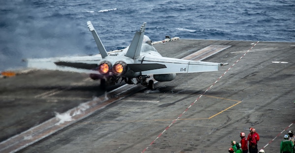 An F/A-18F Super Hornet attached to the "Diamondbacks" of Strike Fighter Squadron (VFA) 102 launches from the flight deck of the U.S. Navy’s only forward-deployed aircraft carrier USS Ronald Reagan (CVN 76).