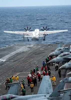 SOUTH CHINA SEA (July 13, 2022) A C-2A Greyhound attached to the Providers of Fleet Logistics Squadron (VRC) 30 launches from the flight deck of the U.S. Navy’s only forward-deployed aircraft carrier USS Ronald Reagan (CVN 76). VRC 30 is one of only two carrier-qualified logistics support squadrons, providing supplies, personnel, and logistics support to Carrier Strike Group 5. Ronald Reagan, the flagship of Carrier Strike Group 5, provides a combat-ready force that protects and defends the United States, and supports alliances, partnerships and collective maritime interests in the Indo-Pacific region. (U.S. Navy photo by Mass Communication Specialist 3rd Class Gray Gibson)