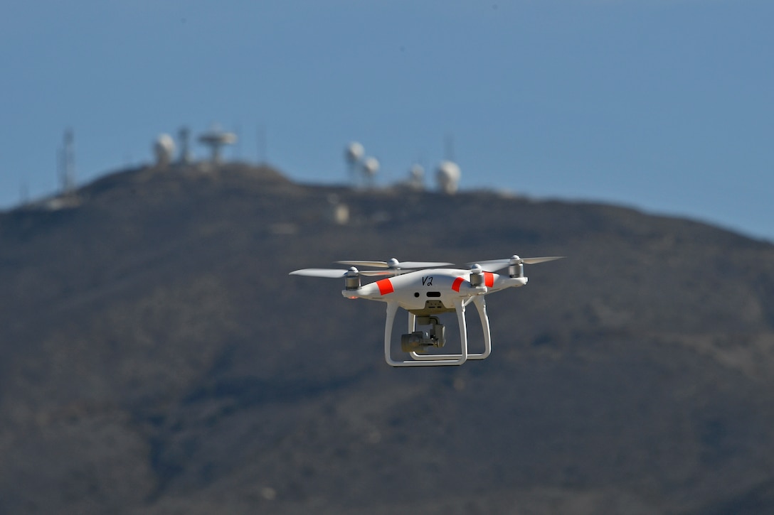 A small unmanned aerial system flies over Naval Base Ventura County, Point Mugu, California. Program Executive Officer Land Systems recently started delivering the Installation-Counter small Unmanned Aircraft Systems system to select Marine Corps installations. Known as I-CsUAS, the system is designed to protect Marine Corps installations by detecting, identifying, tracking and defeating small UASes such as commercially-available drones. (U.S. Navy photo by Ensign Drew Verbis)