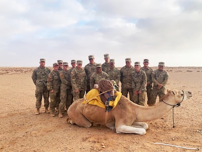 Members of the Wisconsin Army National Guard’s Battery A, 1st Battalion, 121st Field Artillery at Tan-Tan, Morocco, after a dinner hosted by the Moroccan field artillery regiment celebrating a simulated High Mobility Artillery Rocket System rapid infiltration mission during the African Lion 22 exercise, June 2022. African Lion is U.S. Africa Command’s largest premier joint annual exercise hosted by Morocco, Ghana, Senegal and Tunisia.