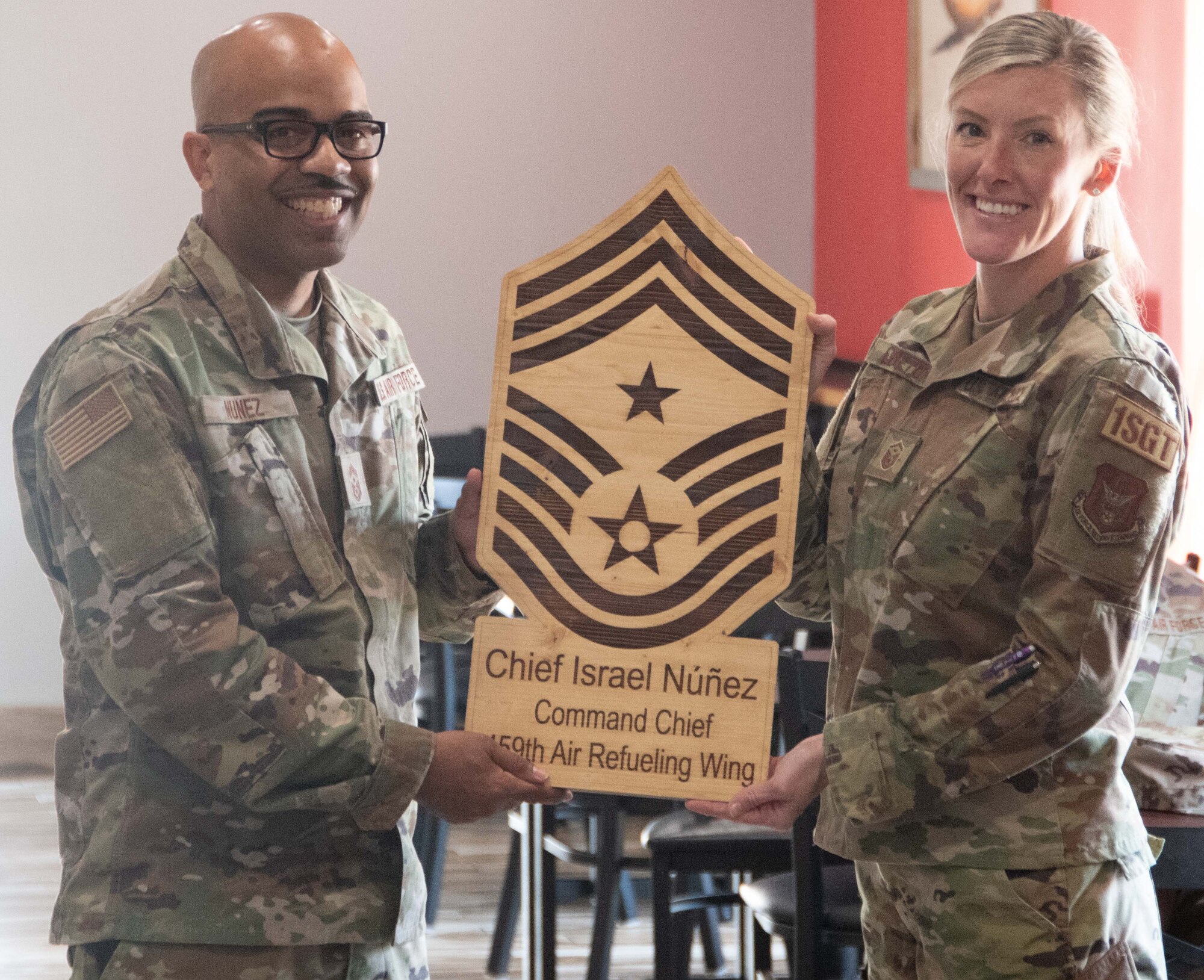 The 459th Air Refueling Wing says farewell to its Command Chief, Chief Master Sgt. Israel Nunez during his farewell lunch in Camp Springs, Md., July 13, 2022. Chief Nunez took on this position here in January 2021, but has now been tapped to lead Fourth Air Force's enlisted corps as the Fourth Air Force Command Chief.