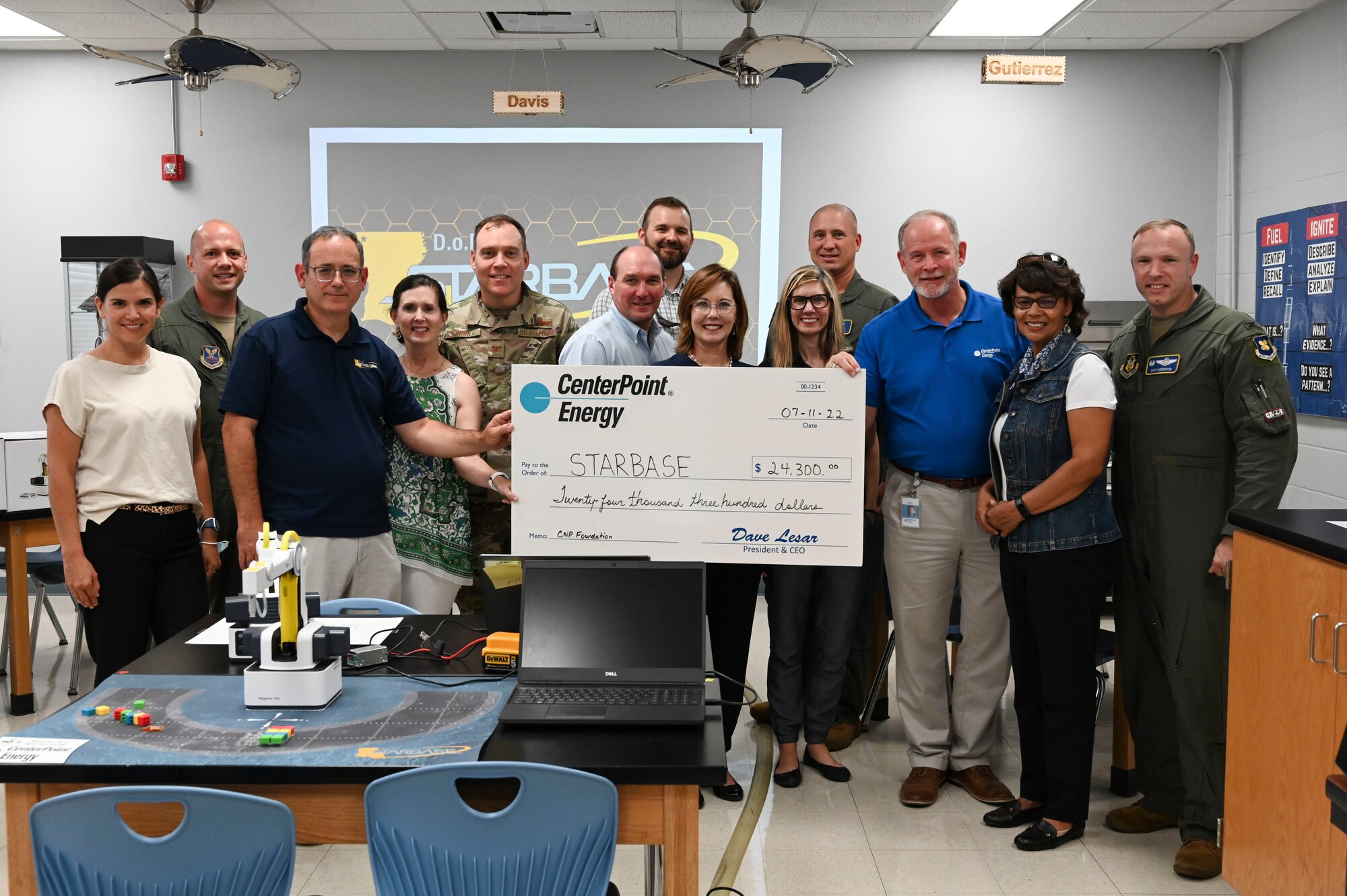 CenterPoint Energy members present a grant to DoD STARBASE Louisiana July 11, 2022 at Barksdale Air Force Base, Louisiana
