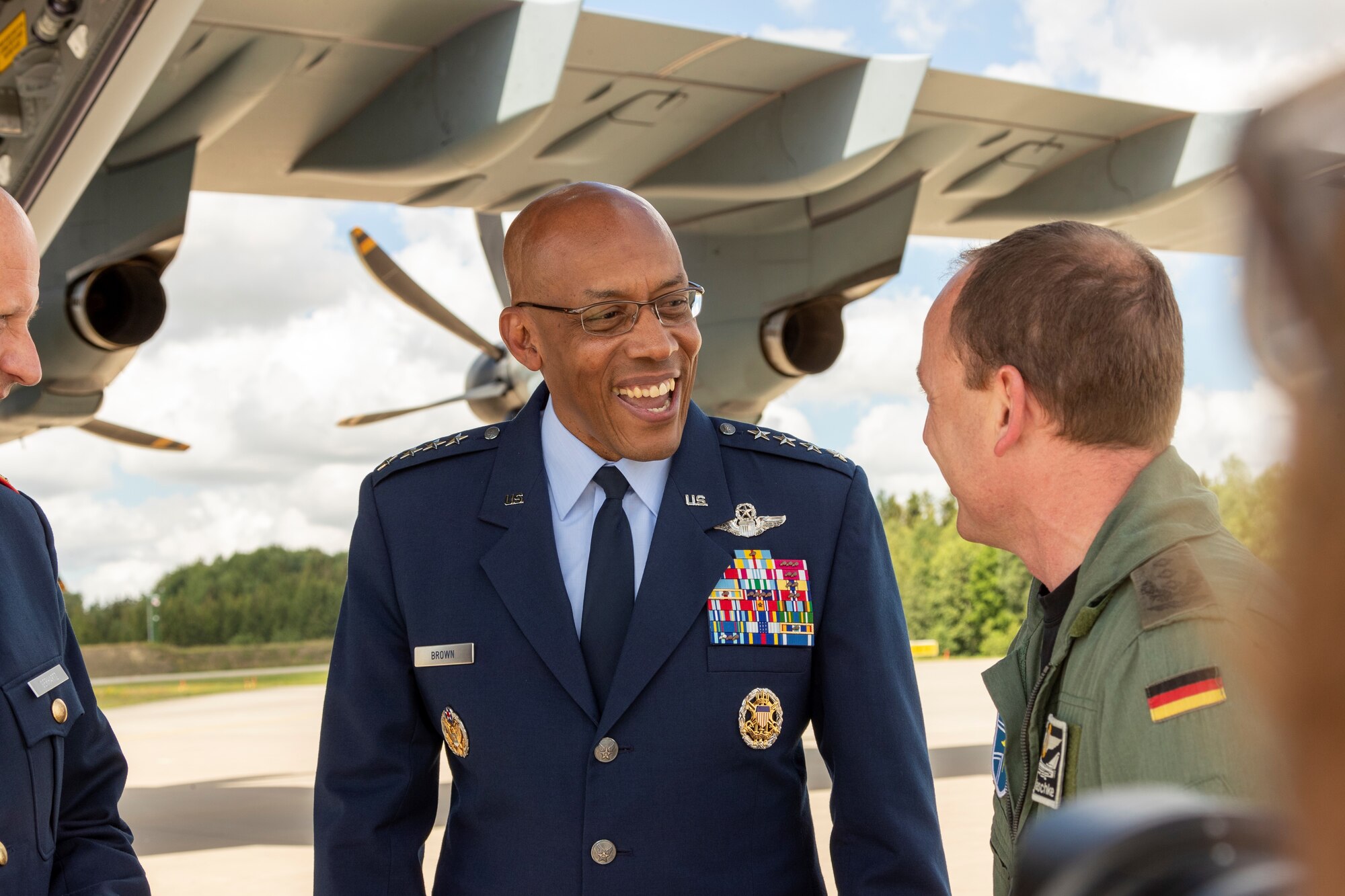 U.S. Air Force Chief of Staff Gen. CQ Brown, Jr. meets members of the German Air Force at Rostock-Laage Airfield, Germany, July 11, 2022. Brown and German Air Chief Lt. Gen. Ingo Gerhartz flew in formation over the Baltic Sea to strengthen ties between the two nations. (German Air Force photo by Sebastian Thomas)
