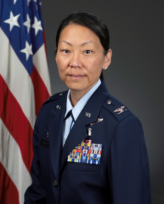 An Airman poses for an official portrait.