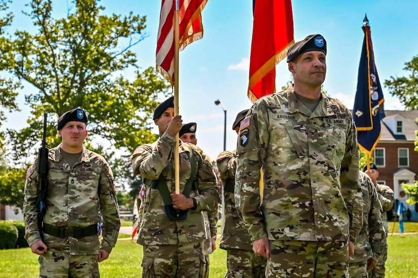 U.S. Army Colonel James Krueger, 174th Infantry Brigade commander, stands at attention with the color guard during a change of command ceremony on 13 July, 2022 at Joint Base McGuire-Dix-Lakehurst N.J. The 174th Infantry Brigade is responsible for preparing soldiers of the U.S. Army Reserve and National Guard for deployment through battle training in maneuvers, equipment, and other details. (U.S. Air Force photo by Senior Airman Matt Porter)