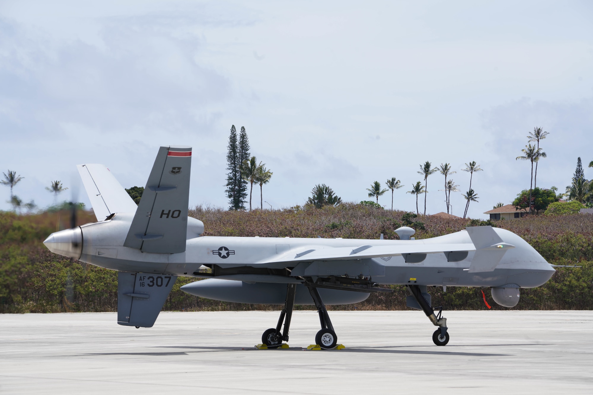 220706-F-IU083-1286 KANEOHE BAY, Hawaii (July 6, 2022) - A U.S. Air Force MQ-9 Reaper, assigned to the 49th Wing, lands at Marine Corps Air Station Kaneohe Bay, Hawaii, during Rim of the Pacific (RIMPAC) 2022. Unmanned and remotely operated vessels extend the capability of interconnected manned platform sensors to enhance the warfighting capacity of multinational joint task forces. Twenty-six nations, 38 ships, four submarines, more than 170 aircraft and 25,000 personnel are participating in RIMPAC from June 29 to Aug. 4 in and around the Hawaiian Islands and Southern California. The world's largest international maritime exercise, RIMPAC provides a unique training opportunity while fostering and sustaining cooperative relationships among participants critical to ensuring the safety of sea lanes and security on the world's oceans. RIMPAC 2022 is the 28th exercise in the series that began in 1971. (U.S. Air Force photo by Airman 1st Class Ariel O'Shea)