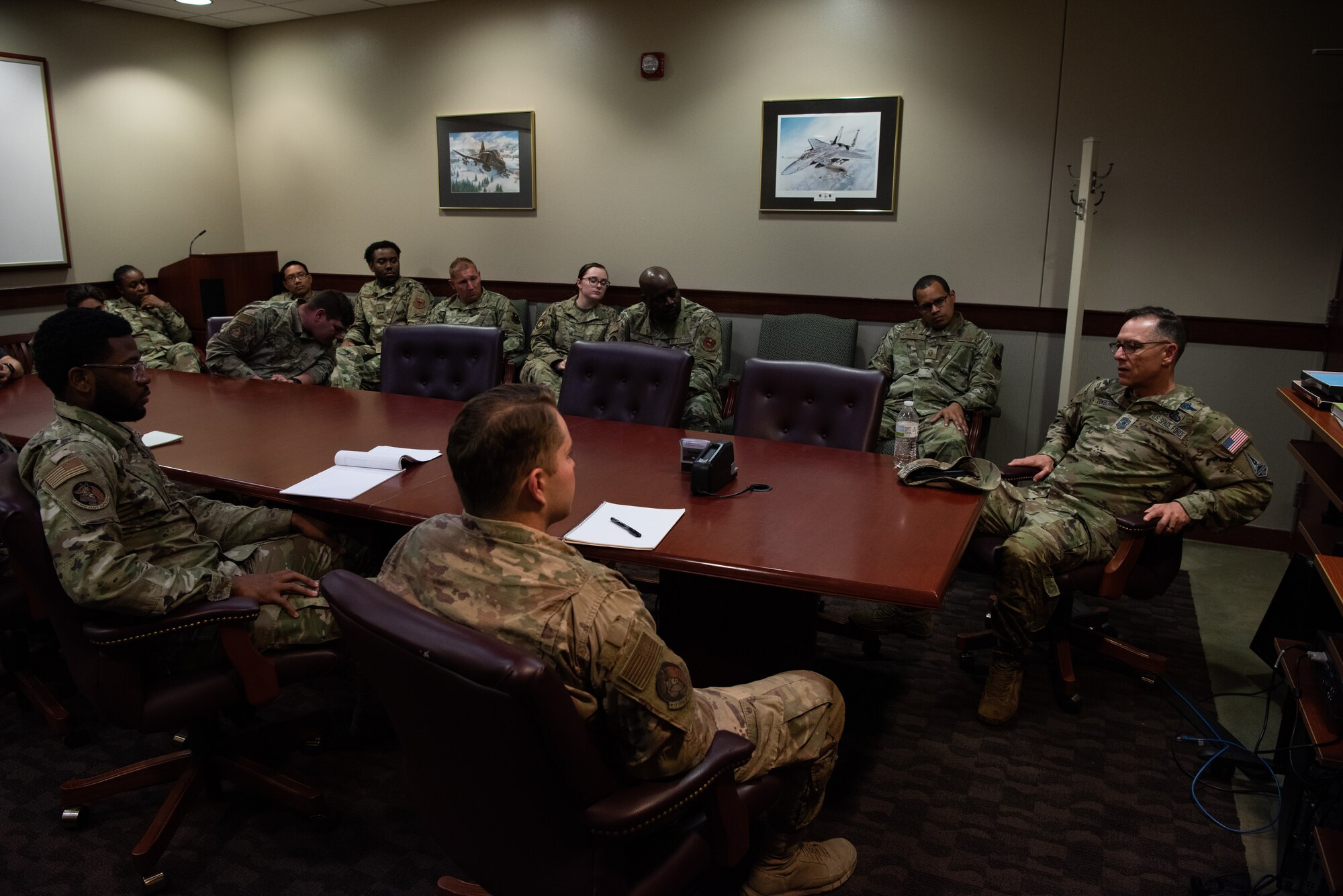 Chief Master Sergeant of the Space Force Roger A. Towberman attends a briefing with the 17th Training Wing finance and personnel offices, at Goodfellow Air Force Base, Texas, July 8, 2022. Chief  Towberman thanked the Airmen for all of the hard work they put forward when assisting Guardians assigned to Goodfellow. (U.S. Air Force photo by Senior Airman Michael Bowman)