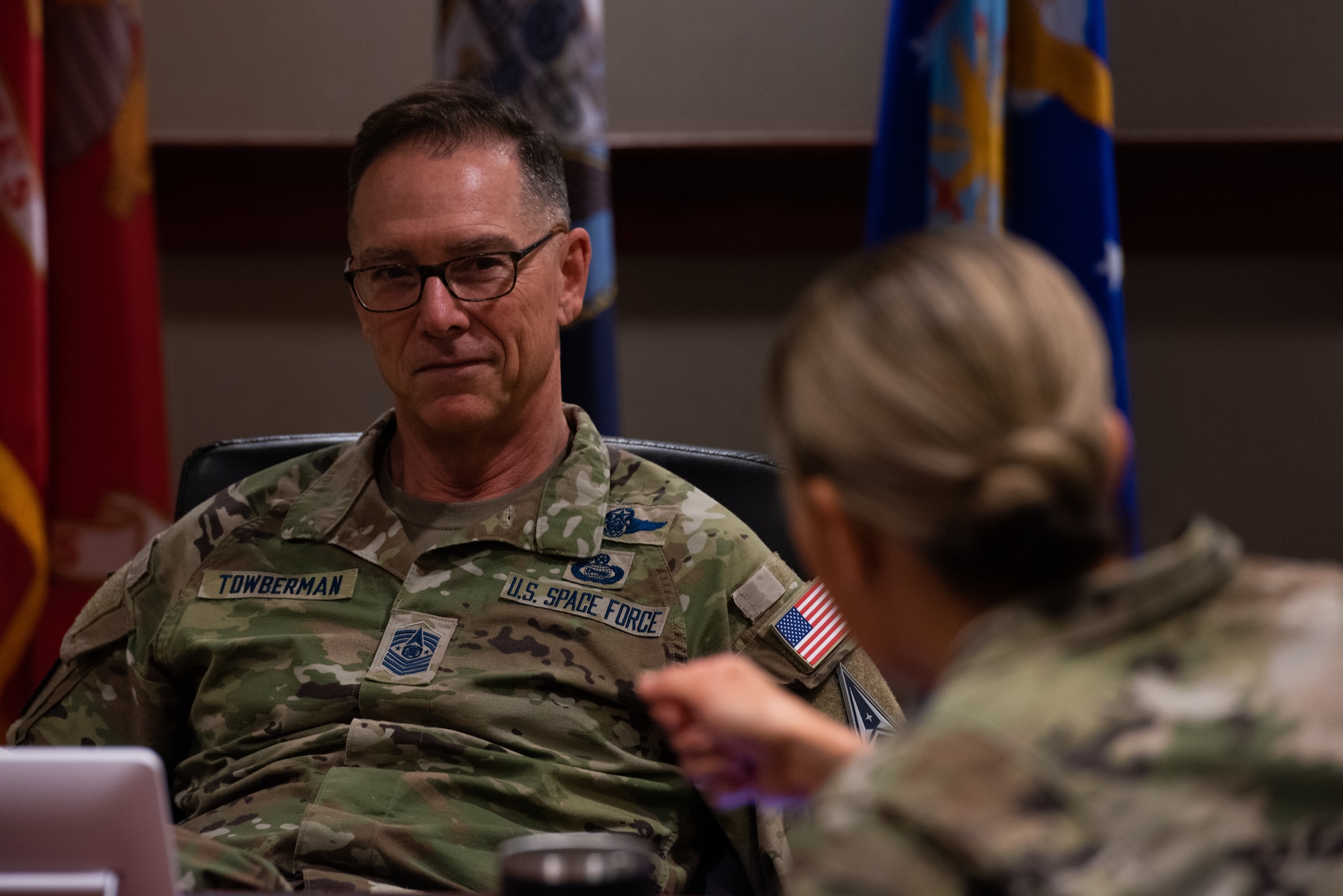 Chief Master Sergeant of the Space Force Roger A. Towberman sits in a briefing with Chief Master Sergeant Rebecca Arbona, 17th Training Wing command chief, at Goodfellow Air Force Base, Texas, July 8, 2022. Chief Towberman visited Goodfellow to discuss the future of U.S. Space Force intelligence training. (U.S. Air Force photo by Senior Airman Michael Bowman)