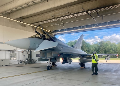 U.S. Air Force Chief of Staff Gen. CQ Brown, Jr. prepares for an orientation flight on a German Air Force Eurofighter Typhoon at Rostock-Laage Airfield, Germany, July 11, 2022. Brown and German Air Chief Lt. Gen. Ingo Gerhartz
flew in formation over the Baltic Sea to strengthen ties between the two nations. (German Air Force photo by Sebastian Thomas)
