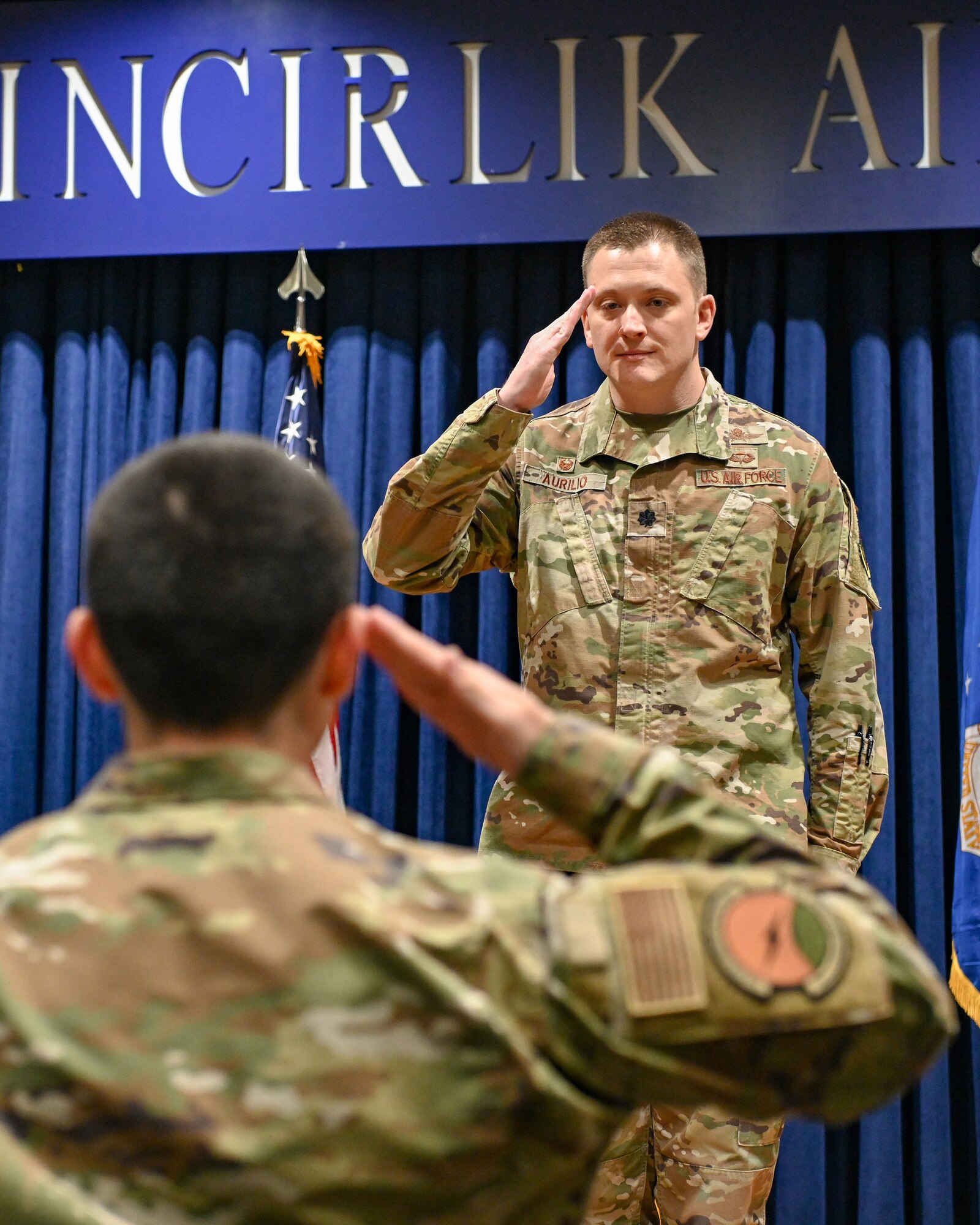 Lt. Col. Marc Aurilio, incoming 39th Communications Squadron commander, renders his first salute during an assumption of command ceremony at Incirlik Air Base, Turkey, June 29, 2022.