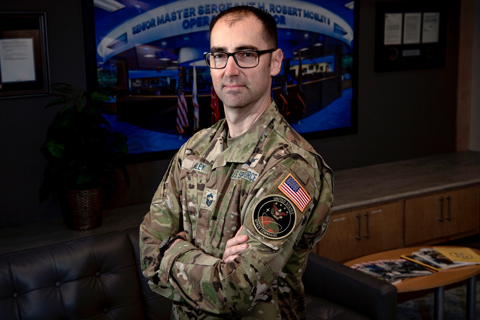 Military man poses in uniform