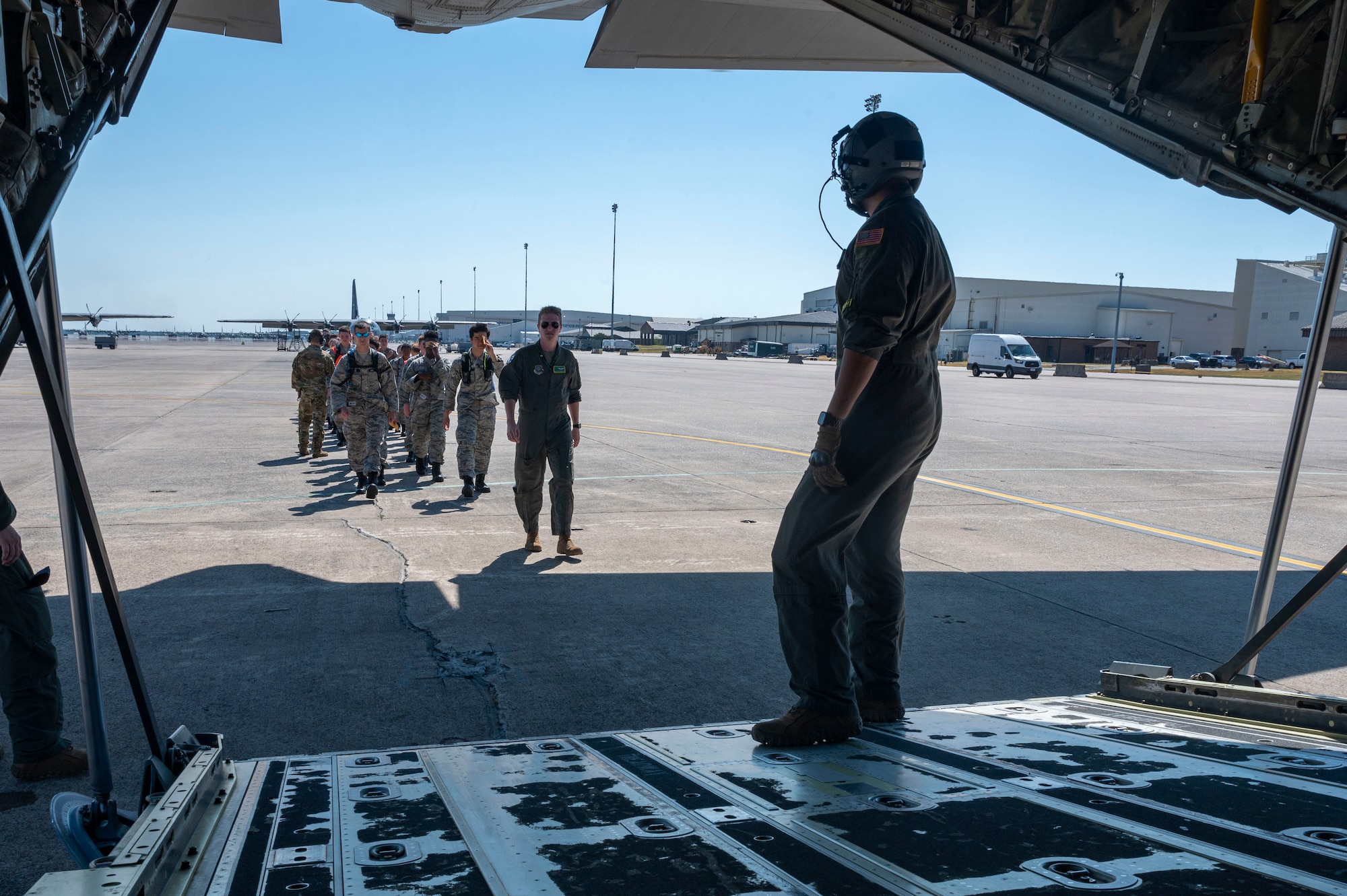 Civil Air Patrol cadets board a C-130J Super Hercules