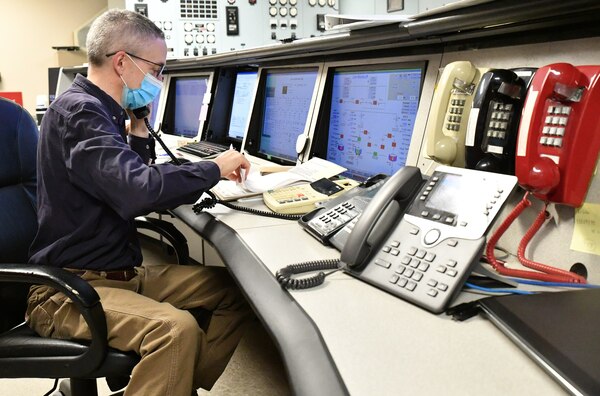 Kevin Herr, Powerplant Shift Operator, takes a call on water flows at the Walter F. George Powerhouse in Fort Gaines, Georgia, on July 7, 2022. Herr, who is deployed to Walter F. George temporarily, has been an operator for the Mobile District the past 25 years.