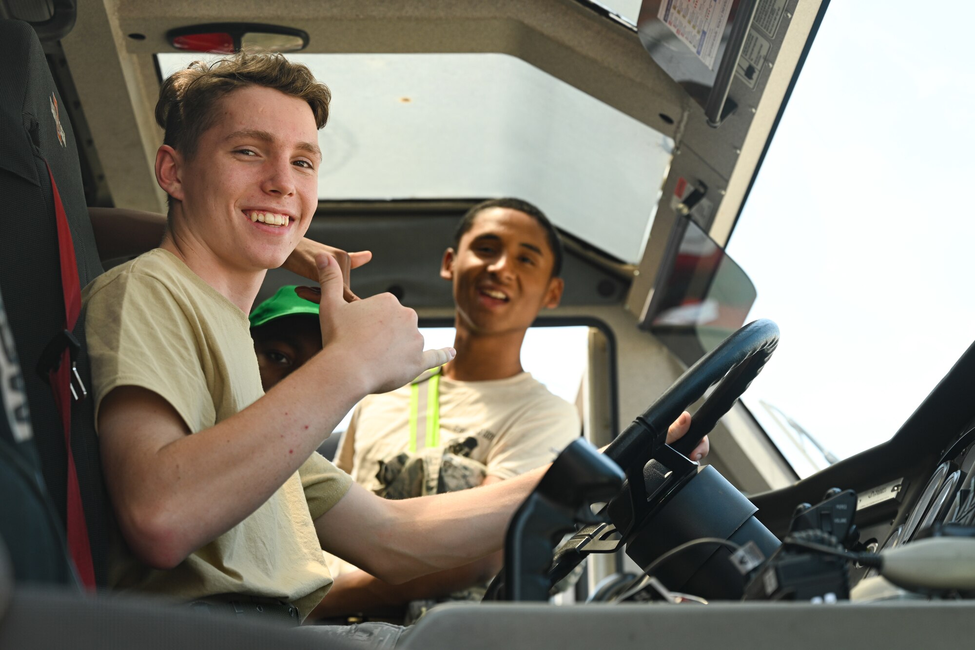 Civil Air Patrol cadets pose for a photo during a base visit