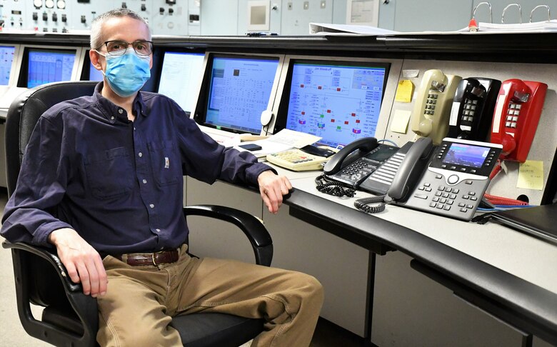 Kevin Herr, Powerplant Shift Operator, sits in the control room of the Walter F. George Powerhouse in Fort Gaines, Georgia, on July 7, 2022. Herr, who is based at Carters Lake and has been an operator for the Mobile District for 25 years, is temporarily filling a need at Walter F. George